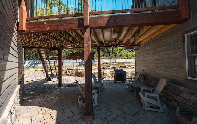 1326 Bald Eagle Dr, Galena, MO 65656 - view of patio featuring stairway, fence, and ceiling fan