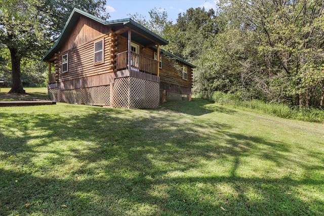 view of home's exterior featuring a lawn