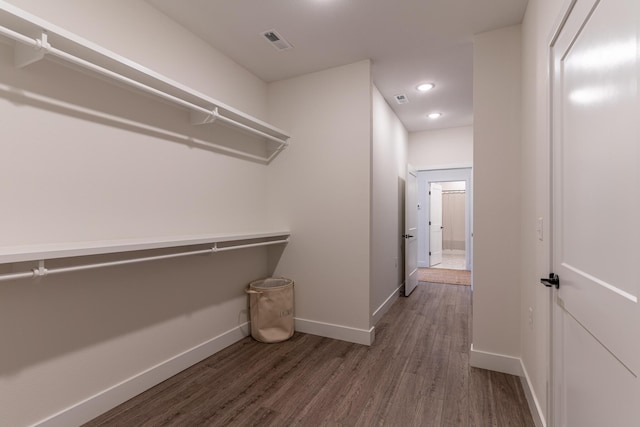 5955 S Farm Rd 163 203B, Springfield, MO 65810 - spacious closet with wood finished floors and visible vents