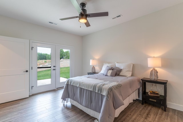 5955 S Farm Rd 163 203B, Springfield, MO 65810 - bedroom featuring french doors, wood finished floors, visible vents, and access to outside