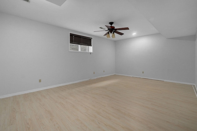 unfurnished room with light hardwood / wood-style floors and ceiling fan