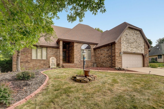 view of front of property featuring a garage and a front lawn