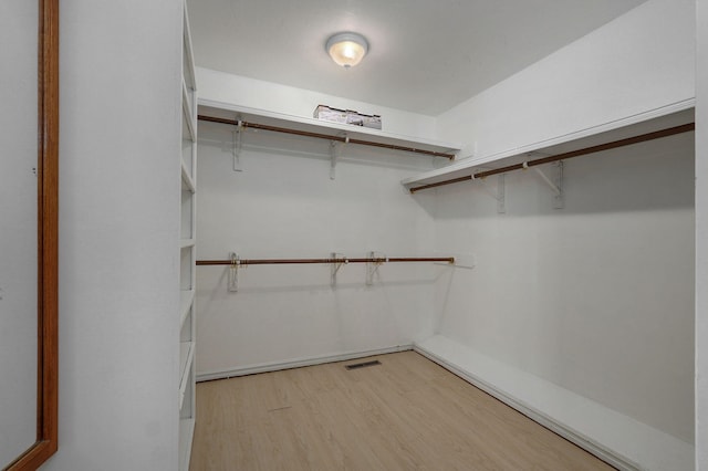 walk in closet featuring light wood-type flooring