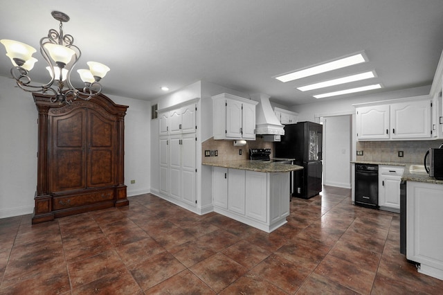 kitchen with white cabinets, custom exhaust hood, kitchen peninsula, backsplash, and black appliances