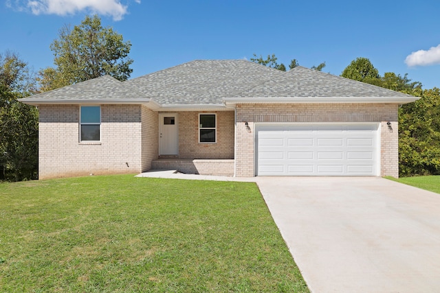 ranch-style home featuring a front lawn and a garage