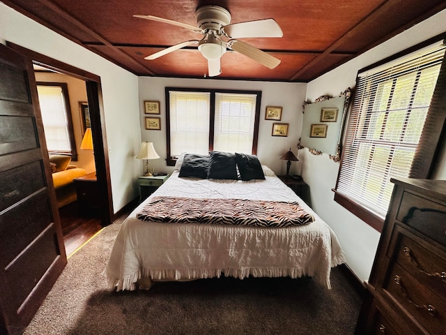 bedroom featuring ceiling fan and wood-type flooring