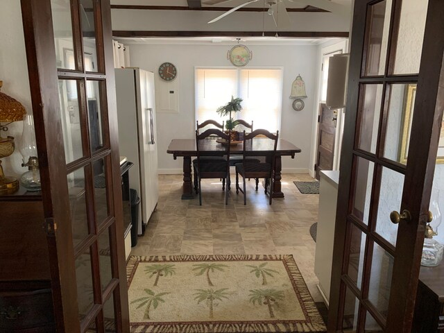 dining area with ceiling fan