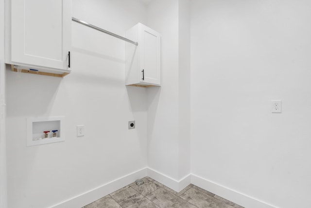 laundry room featuring cabinets, hookup for a washing machine, and electric dryer hookup