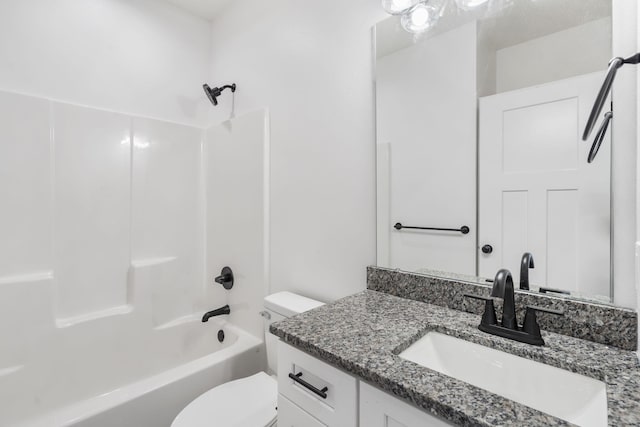 full bathroom with vanity,  shower combination, and toilet