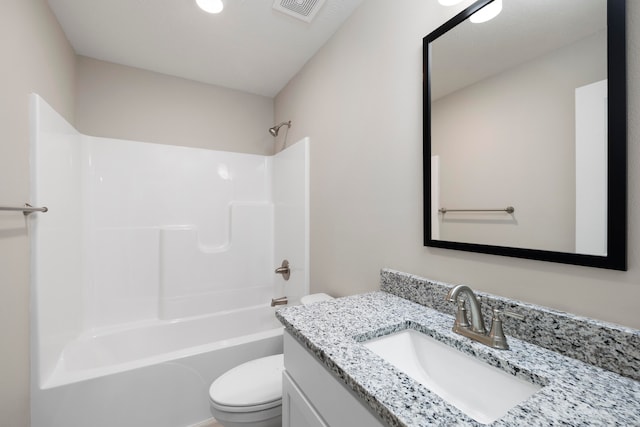 full bathroom featuring shower / bathing tub combination, vanity, and toilet