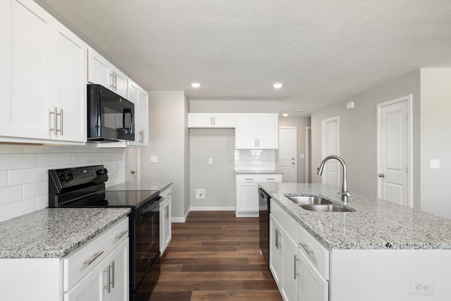 kitchen with white cabinetry, sink, dark hardwood / wood-style flooring, and black appliances