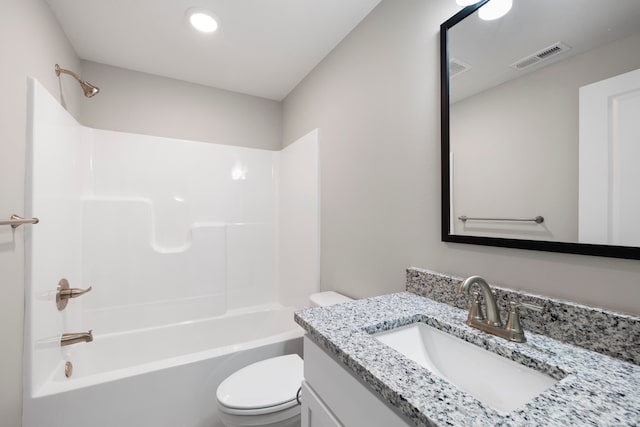 full bathroom featuring shower / bathing tub combination, vanity, and toilet