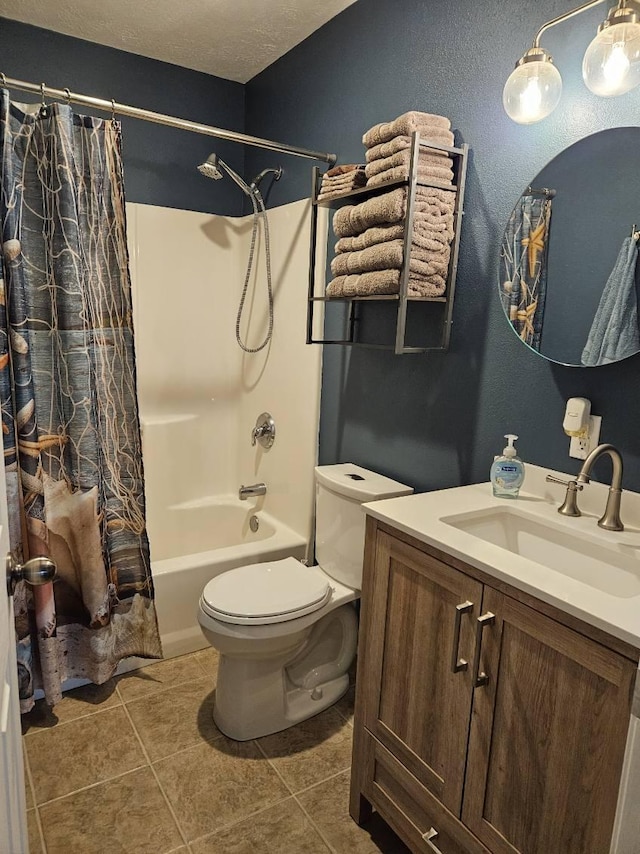 full bathroom with vanity, shower / tub combo, toilet, and tile patterned flooring