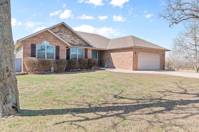 view of front facade with concrete driveway, brick siding, and a front lawn