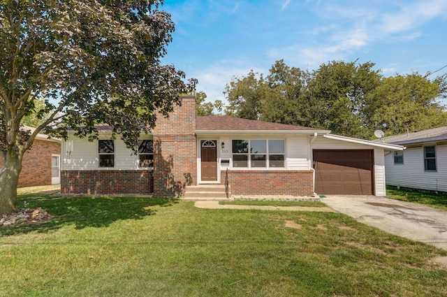 view of front facade with a front lawn and a garage