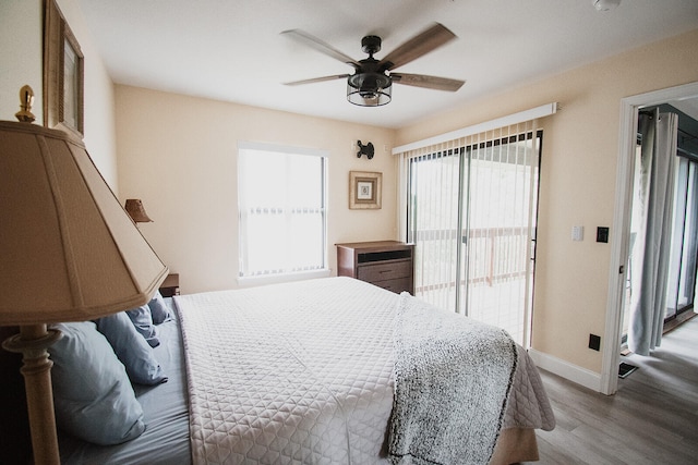 bedroom with light wood-type flooring and ceiling fan