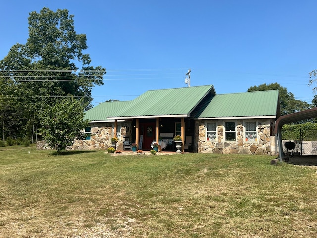 exterior space with a lawn