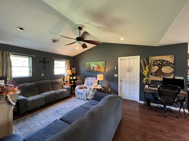 living room featuring ceiling fan, vaulted ceiling, and dark hardwood / wood-style flooring