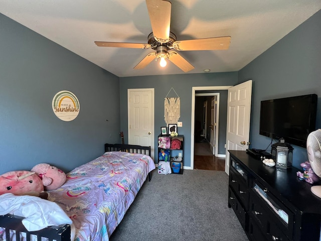 carpeted bedroom featuring ceiling fan