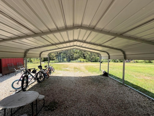 view of car parking featuring a yard