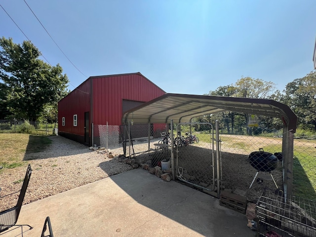 view of parking featuring a carport and a lawn