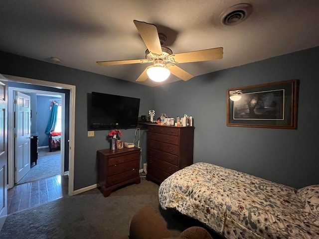 bedroom with ceiling fan and light hardwood / wood-style flooring