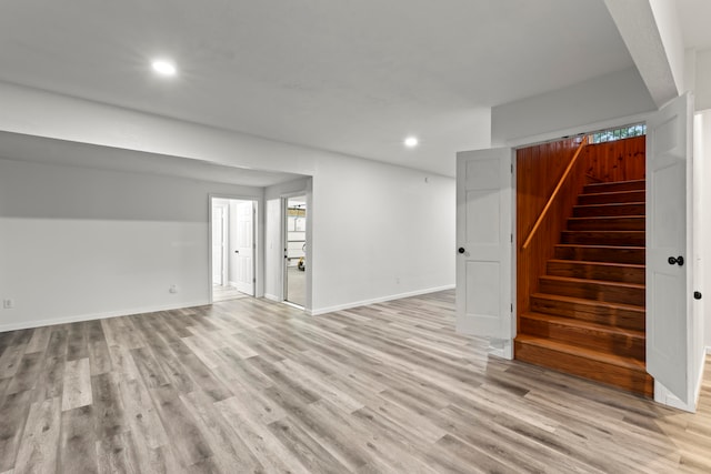 basement featuring light wood-type flooring