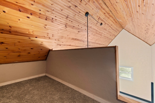 additional living space with lofted ceiling, carpet flooring, and wooden ceiling