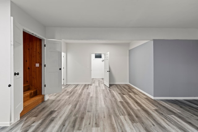 unfurnished room featuring light wood-type flooring