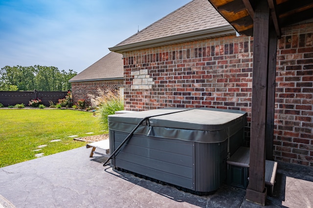 view of patio / terrace featuring a hot tub