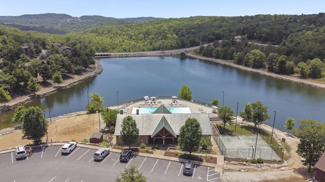 birds eye view of property featuring a water view