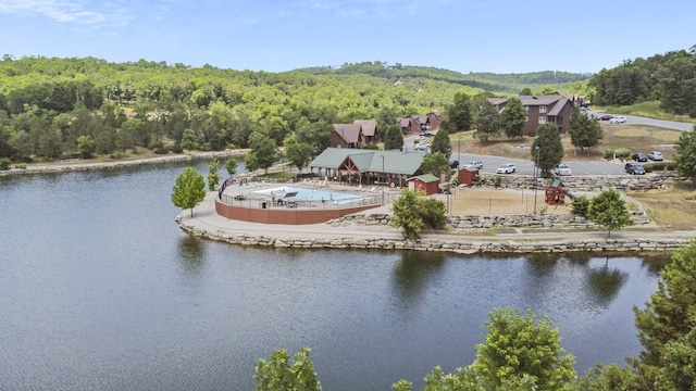 drone / aerial view with a water view