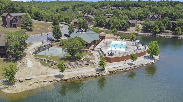 880 Black Forest Ln, Branson West, MO 65737 - aerial view of a forest, a pool area, and a nearby body of water