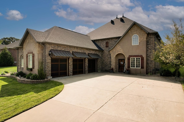 french country home with a front lawn