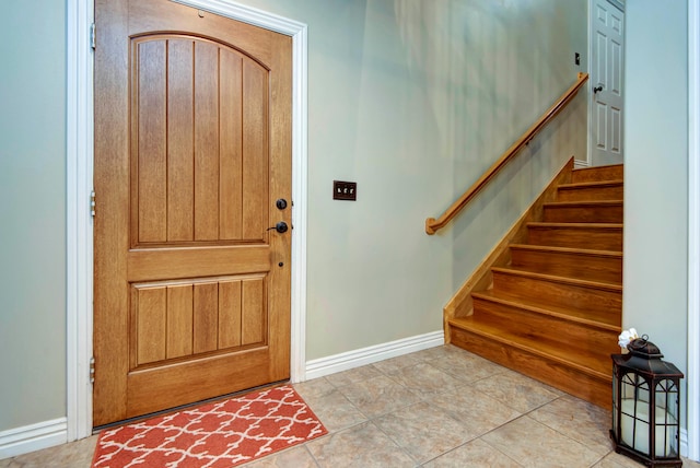 entryway featuring light tile patterned floors