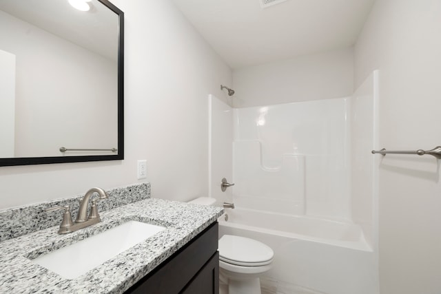 full bathroom with vanity, toilet, and shower / washtub combination