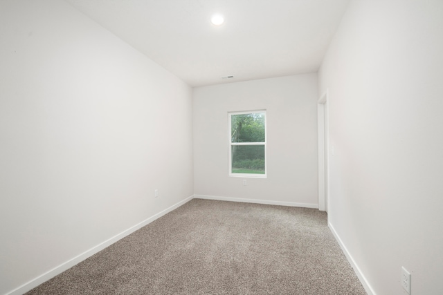 unfurnished room featuring carpet floors