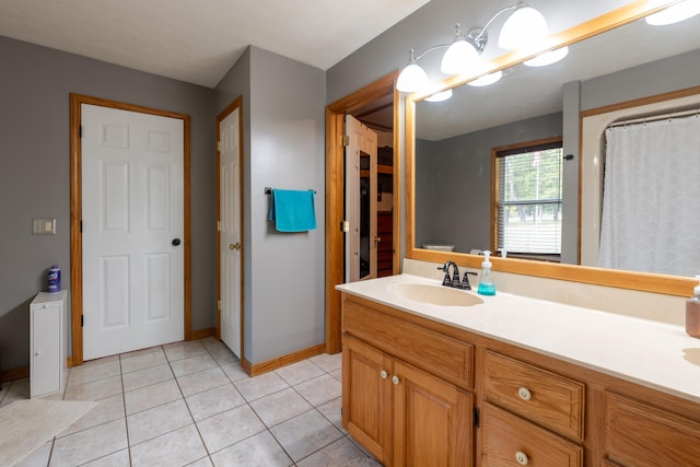 bathroom featuring vanity and tile patterned flooring