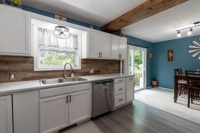 kitchen with white cabinetry, a healthy amount of sunlight, and stainless steel dishwasher