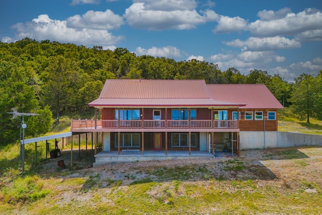 back of property featuring a patio area