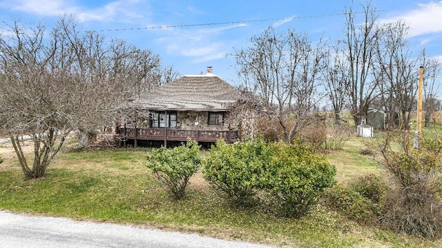 view of front of property featuring a deck