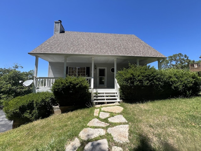 back of property featuring a porch