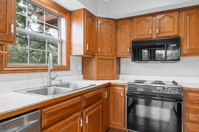 kitchen with black appliances and sink