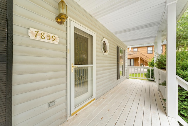 wooden deck with a porch