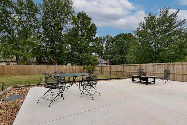 view of patio featuring a fire pit