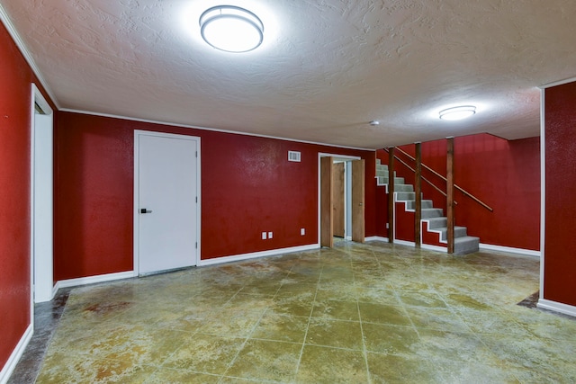 basement with a textured ceiling