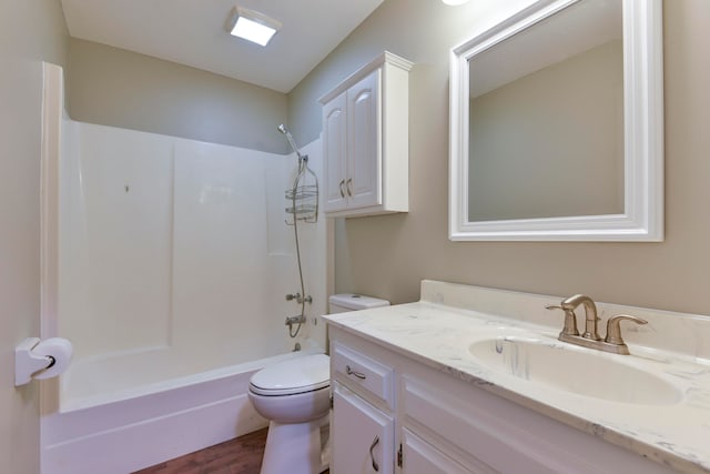 full bathroom featuring wood-type flooring, shower / bathtub combination, vanity, and toilet