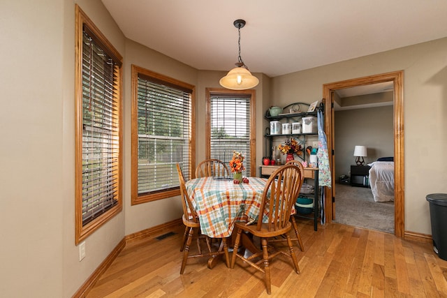 dining room featuring light hardwood / wood-style floors