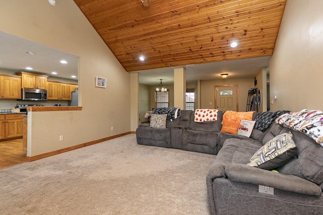 carpeted living room featuring wood ceiling, high vaulted ceiling, and a notable chandelier