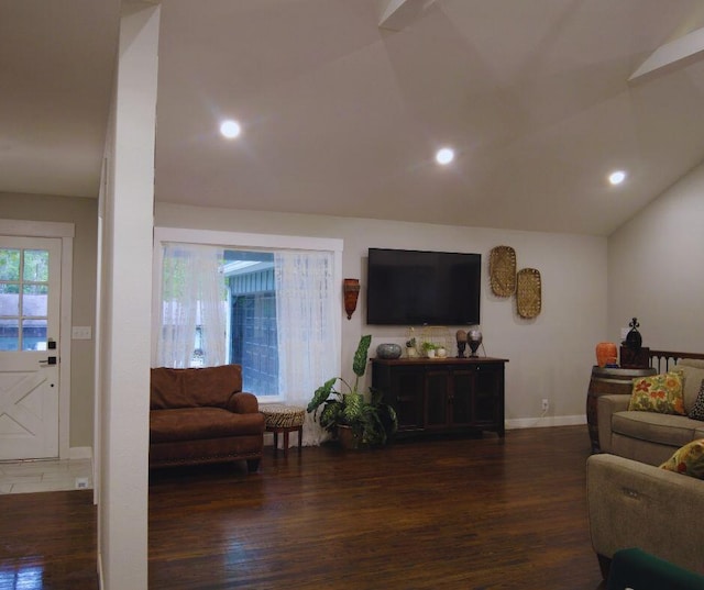 living room with dark wood-type flooring and lofted ceiling